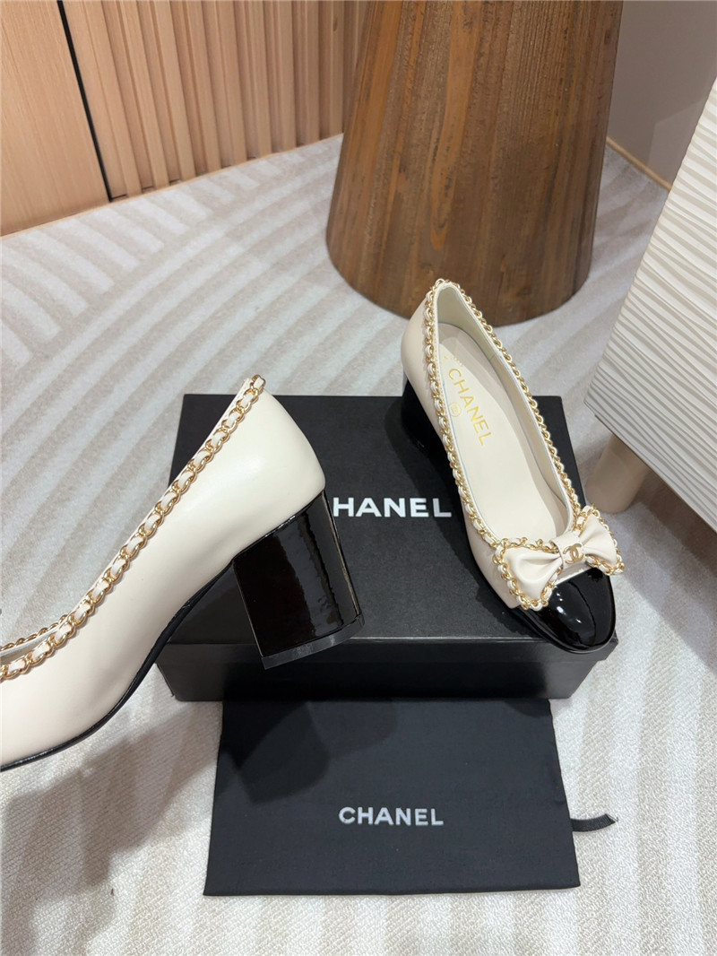 Ch**el bow chain trim ballet pumps in white and black leather