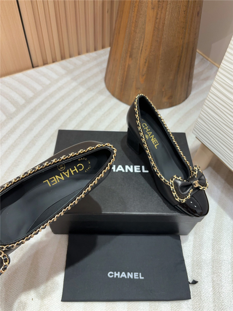 Ch**el bow chain trim ballet pumps in black leather