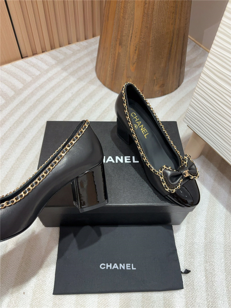 Ch**el bow chain trim ballet pumps in black leather