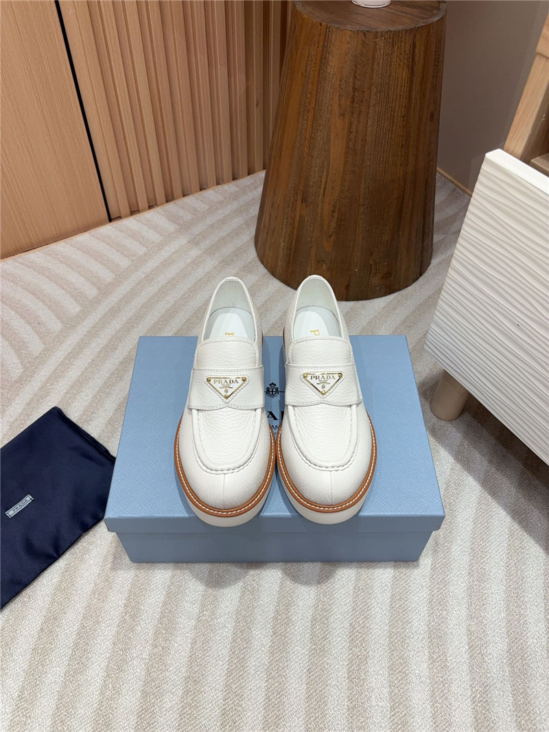 Pra*a white double chocolate leather loafers
