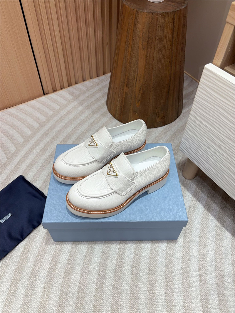 Pra*a white double chocolate leather loafers