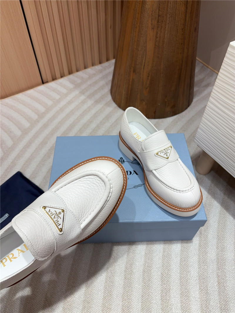 Pra*a white double chocolate leather loafers