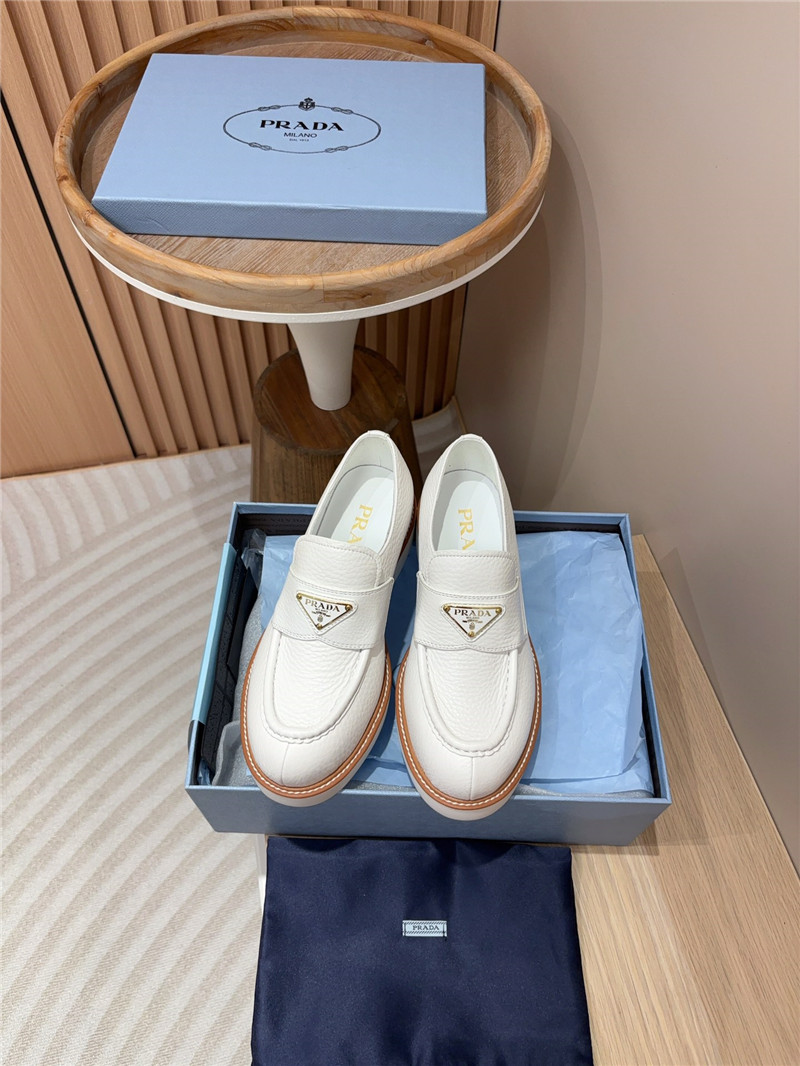 Pra*a white double chocolate leather loafers