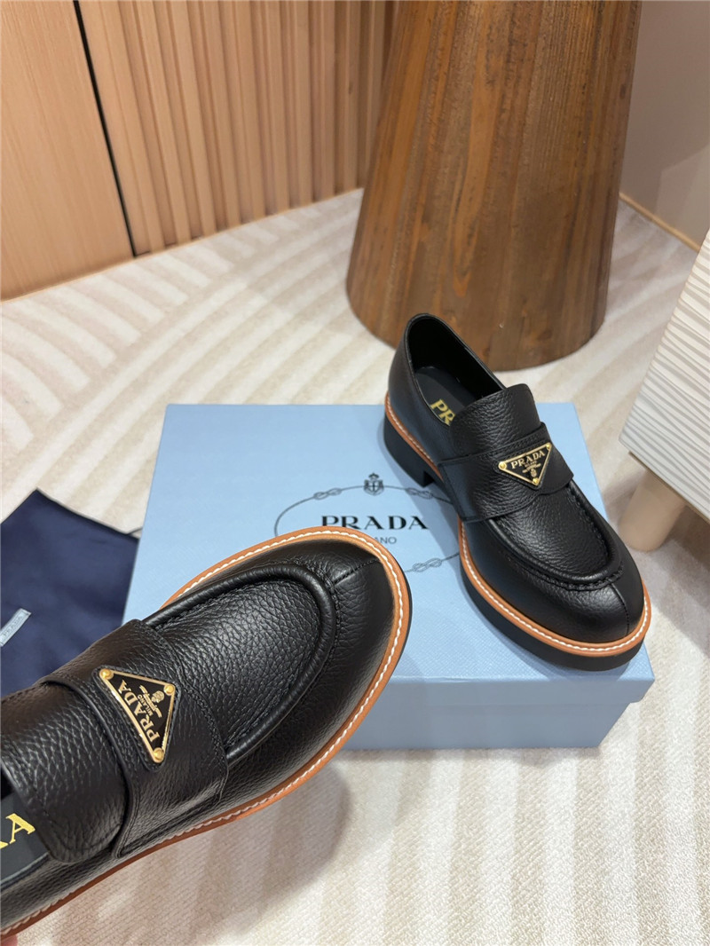 Pra*a black double chocolate leather loafers