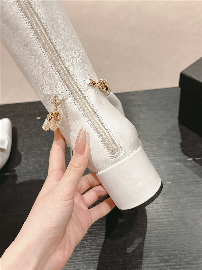 Ch**el white pointed toe bow pearl keen high boots