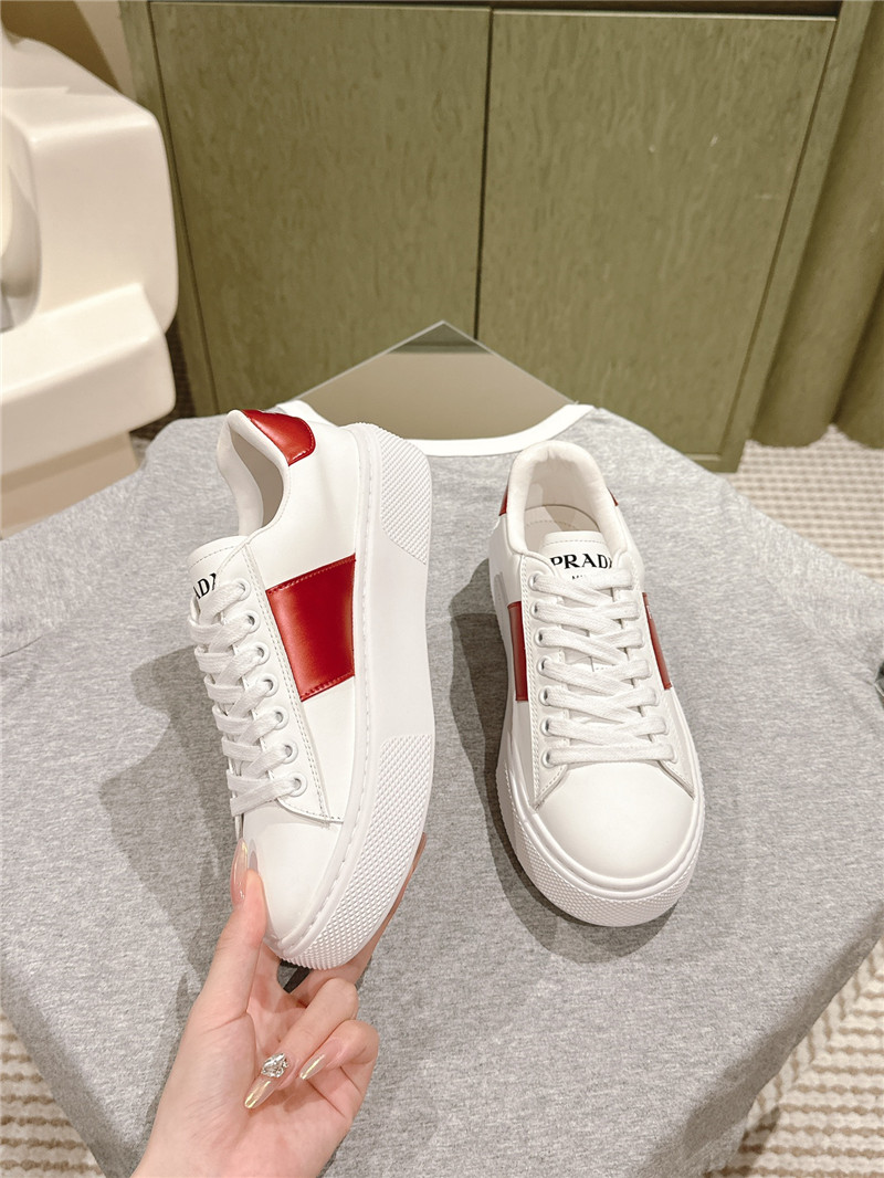 Pra*a white laced low-top sneakers