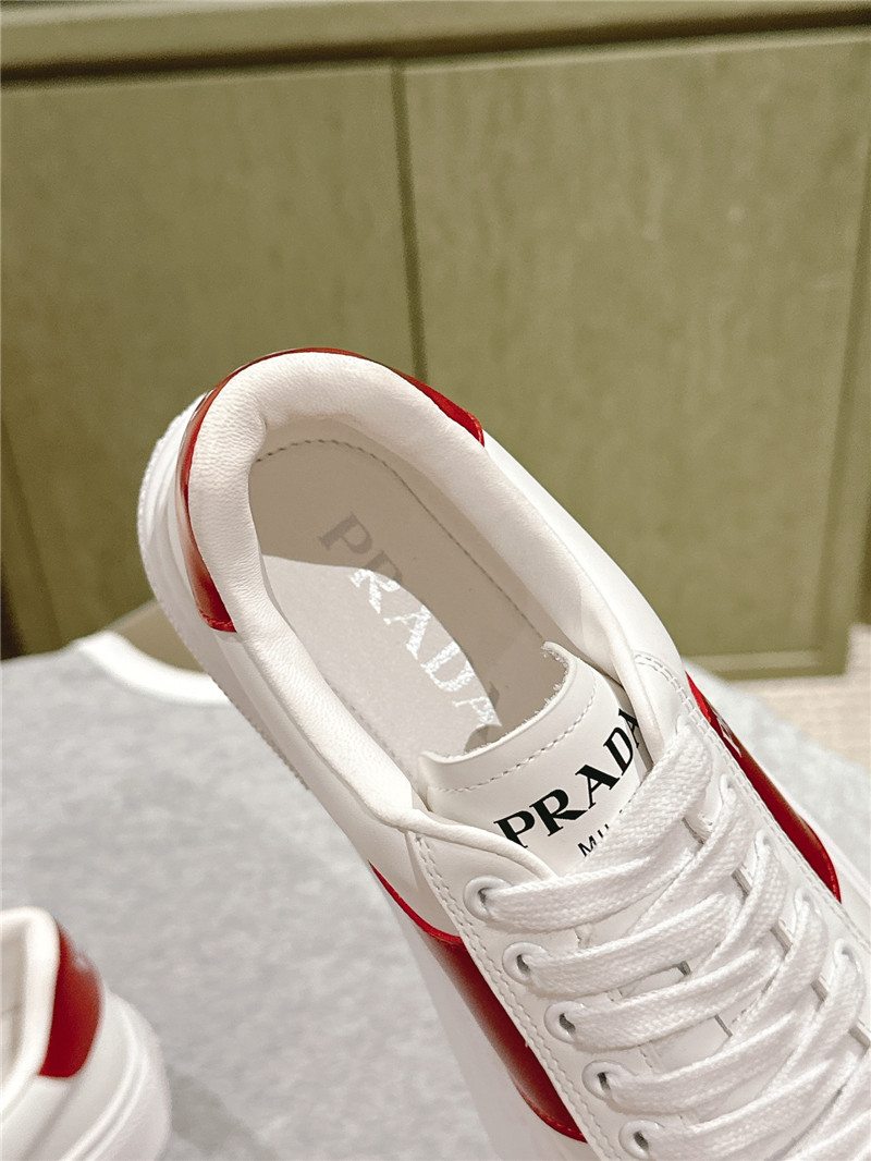Pra*a white laced low-top sneakers
