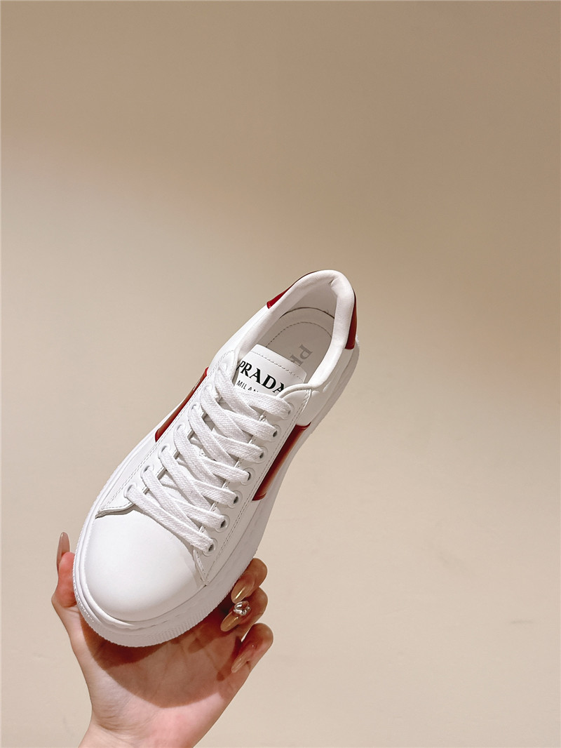 Pra*a white laced low-top sneakers