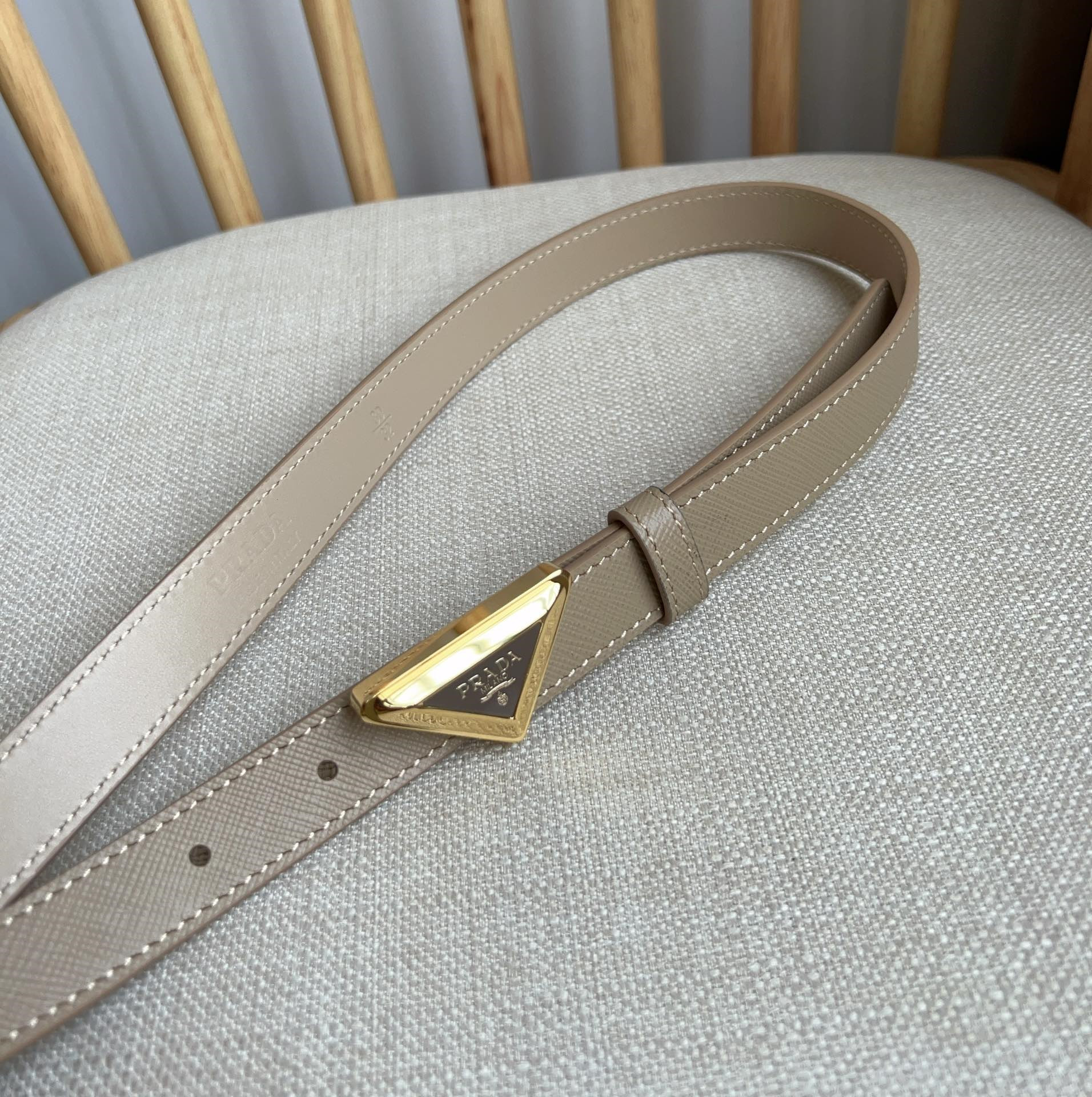 Pra*a triangle logo outline belt