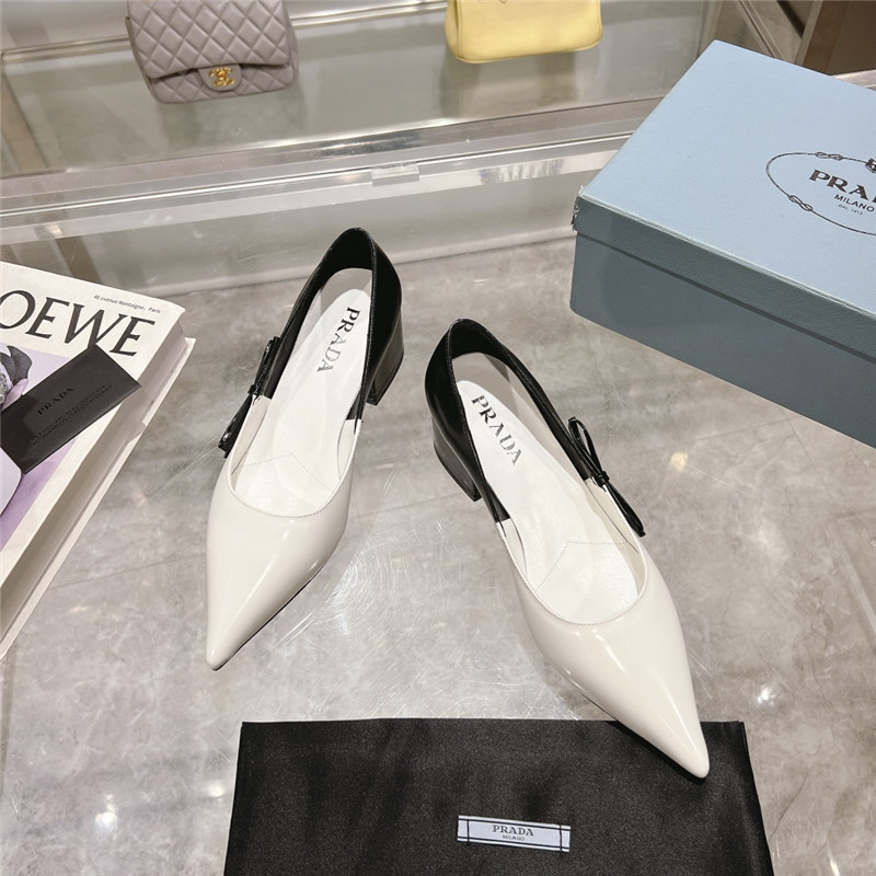 Pra*a chunky pointed pumps in black and white calfskin