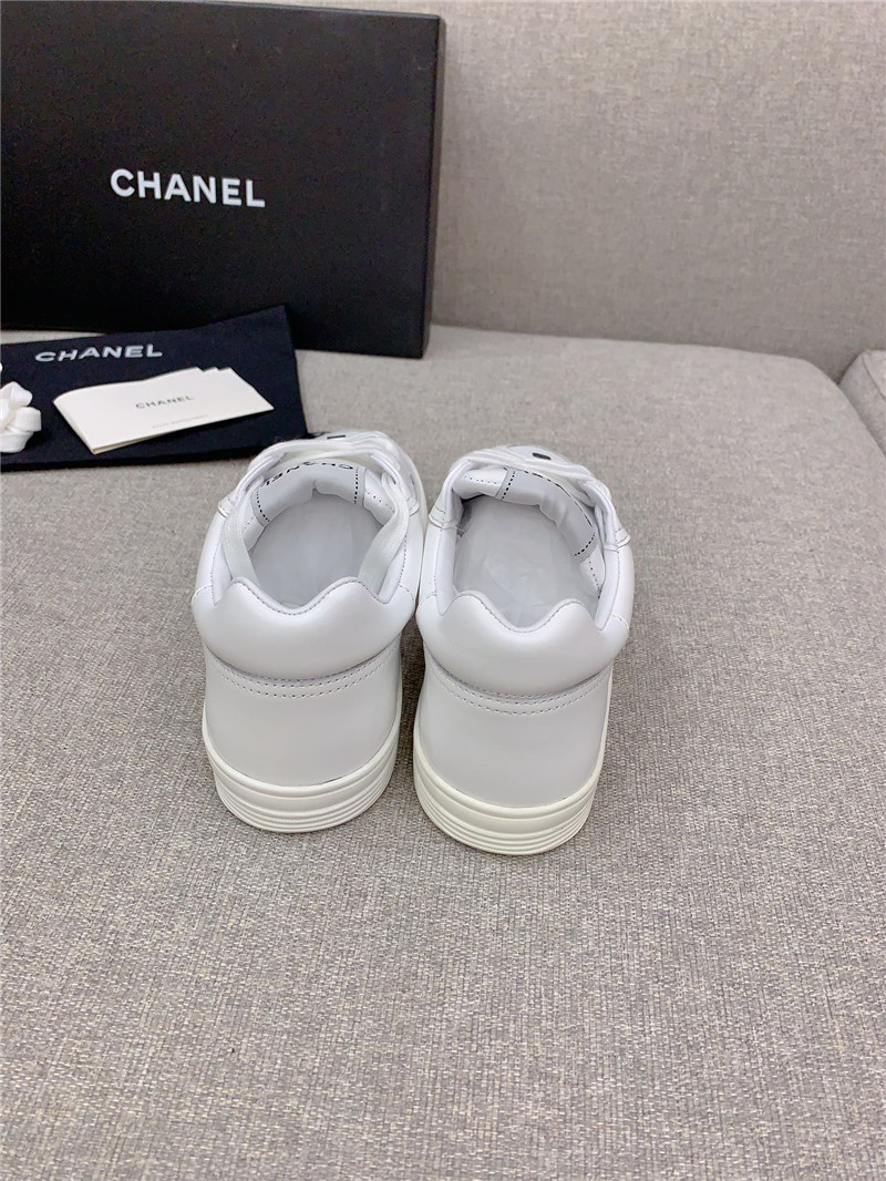 Ch**el white lace-up trainers