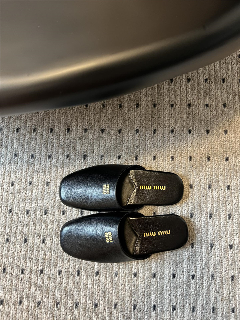 Miu Miu Black Leather Slippers with Embossed Logo
