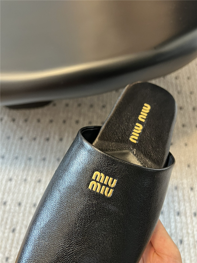 Miu Miu Black Leather Slippers with Embossed Logo