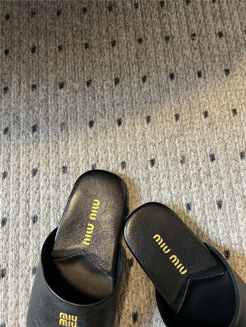 Miu Miu Black Leather Slippers with Embossed Logo