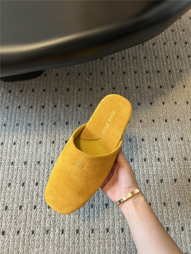 Miu Miu Yellow Suede Slippers with Embossed Logo