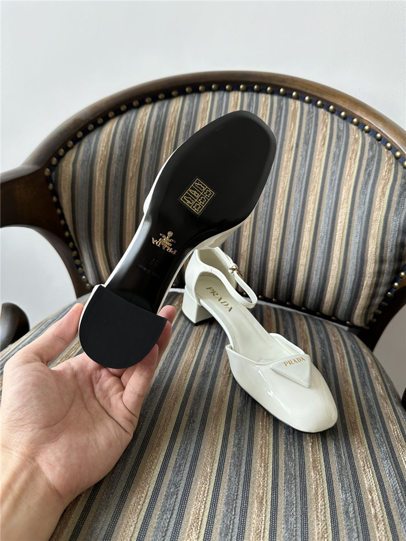 Pra*a white 35mm triangle-logo patent-leather pumps