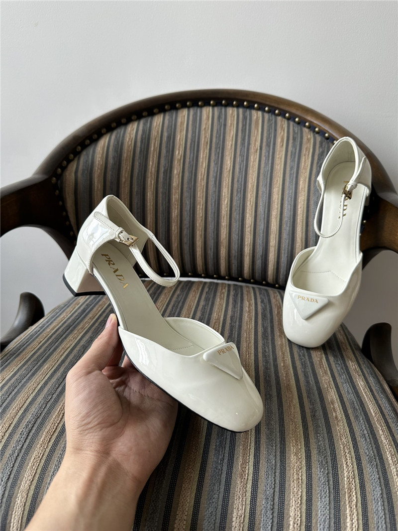 Pra*a white 35mm triangle-logo patent-leather pumps