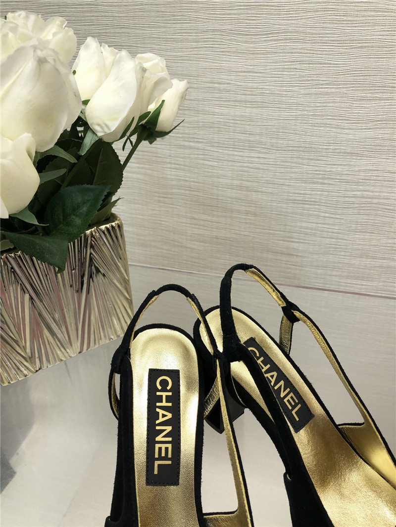 Ch**el black suede and gold leather slingbacks