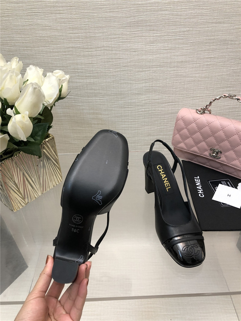 Ch**el black goatskin and patent leather slingbacks