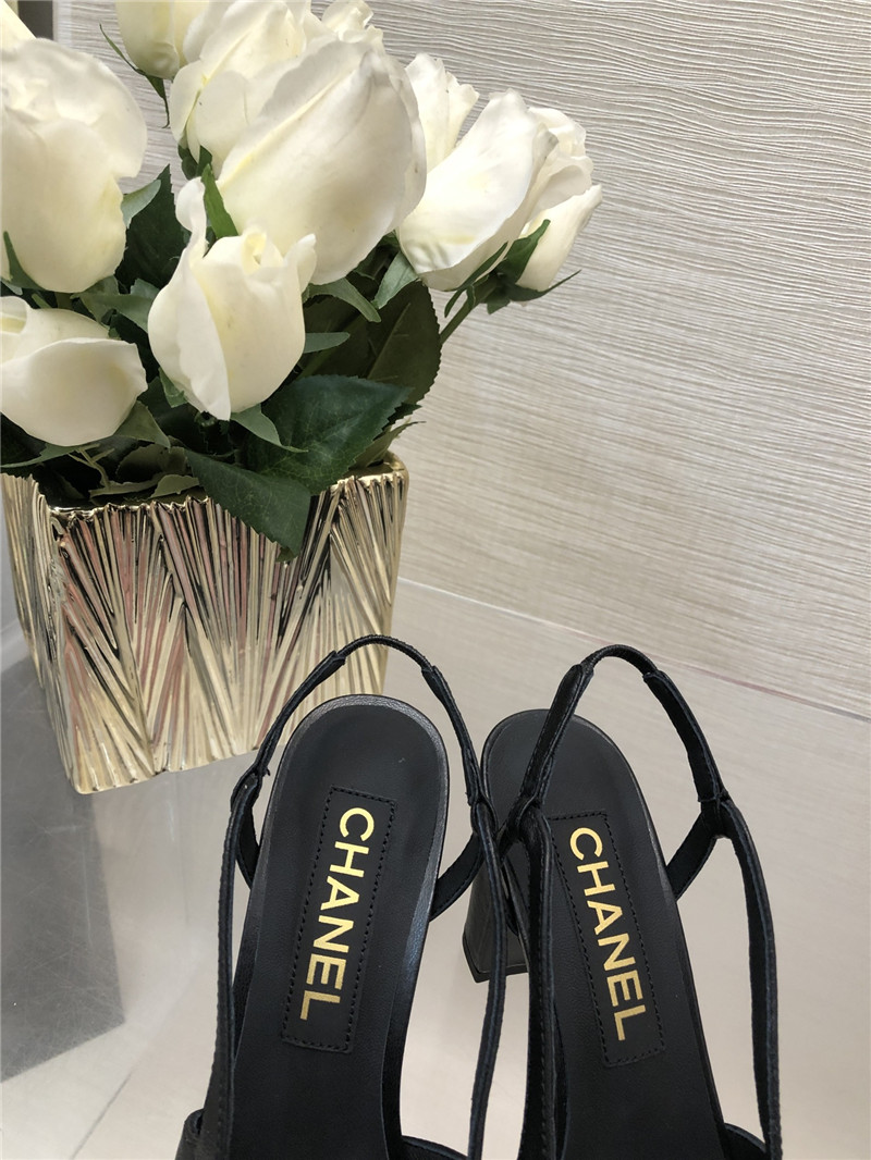Ch**el black goatskin and patent leather slingbacks