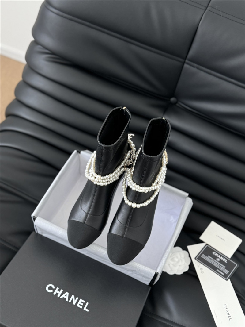 Ch**el black calfskin pearl ankle boots