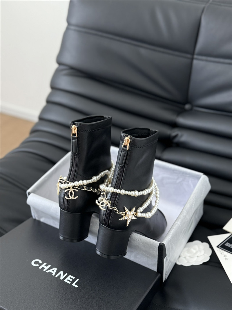 Ch**el black calfskin pearl ankle boots