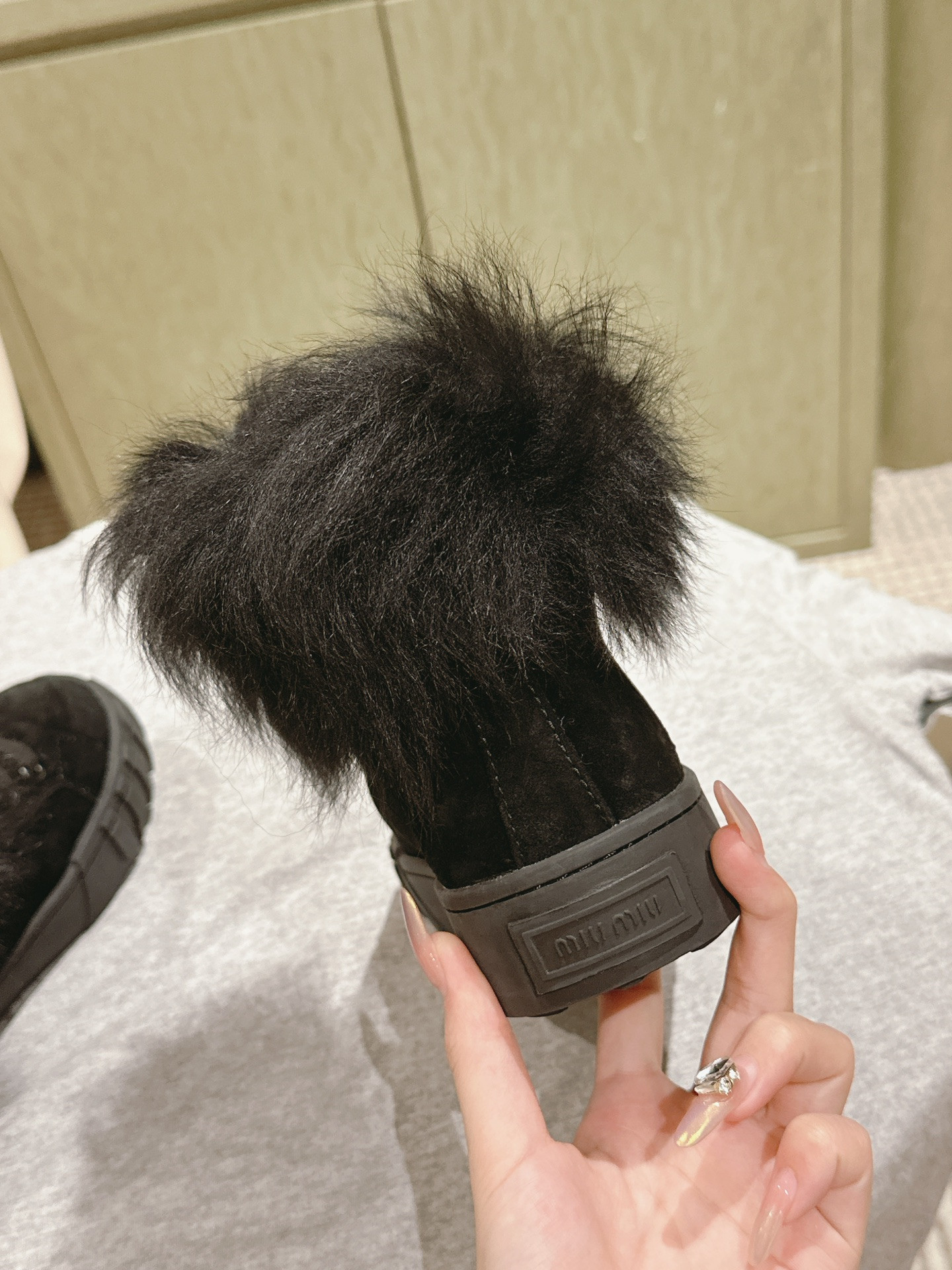 Miu Miu High-Top Black Shearling-Lined Sneakers