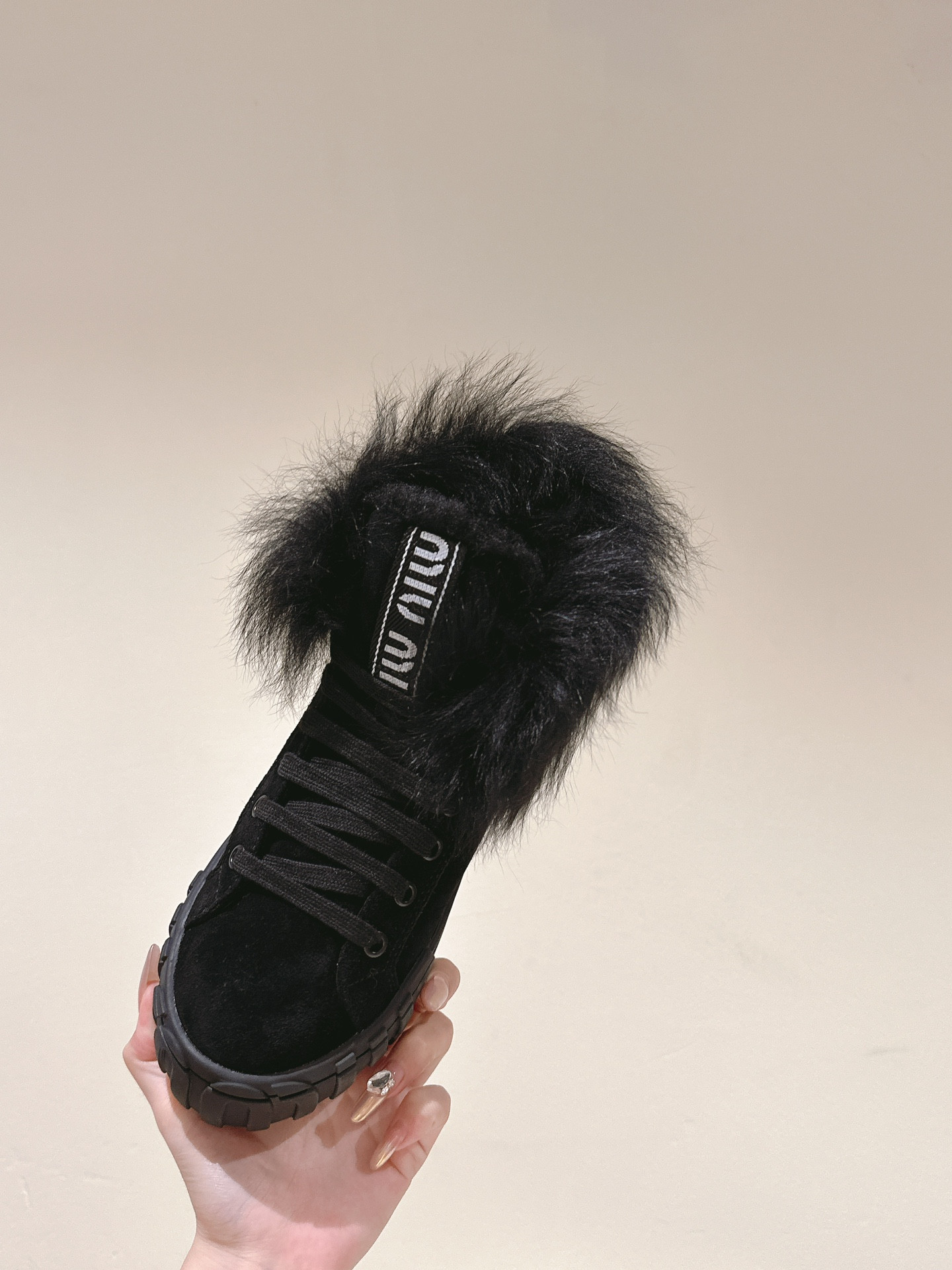 Miu Miu High-Top Black Shearling-Lined Sneakers
