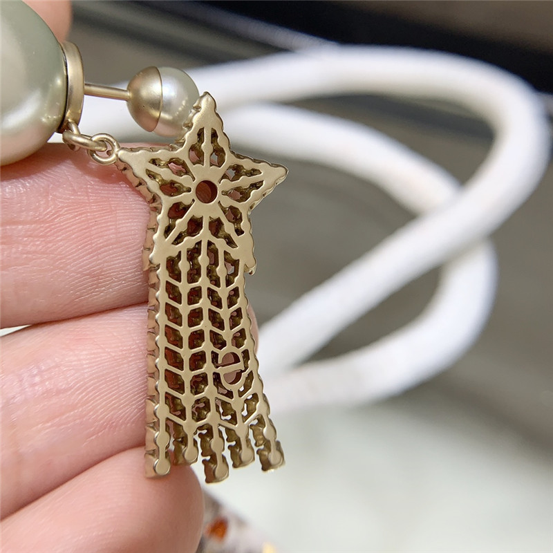 D10r pearl shooting star earrings