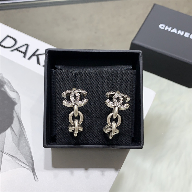 Ch**el double c curved hook hollow small earrings