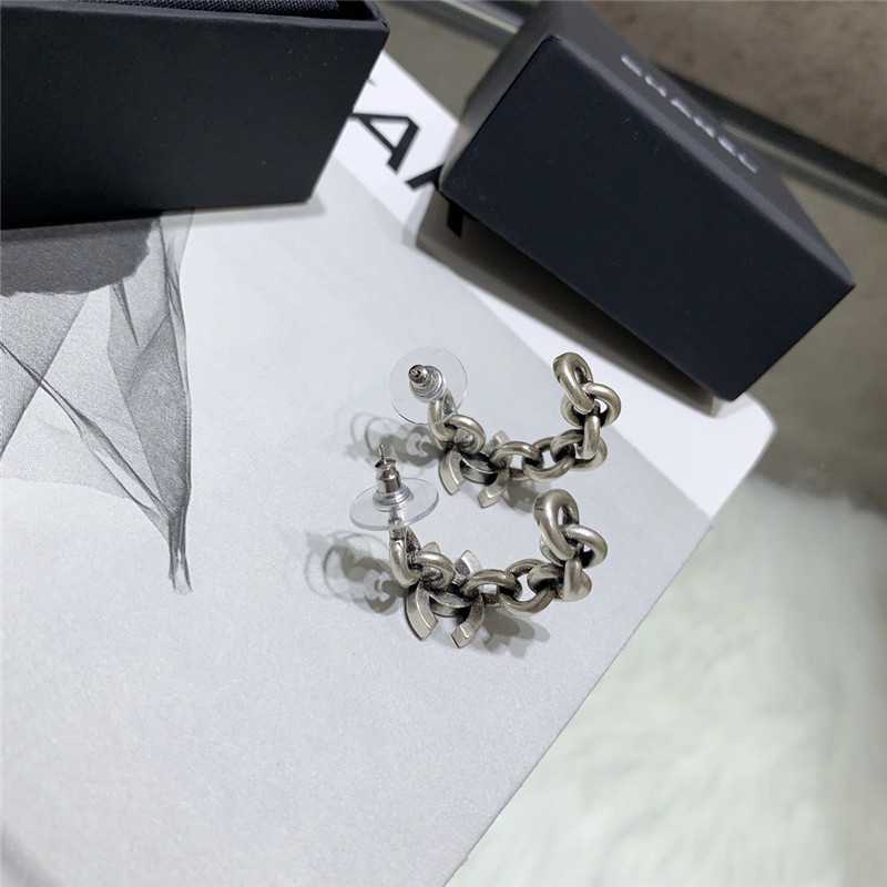 Ch**el double c curved hook hollow small earrings