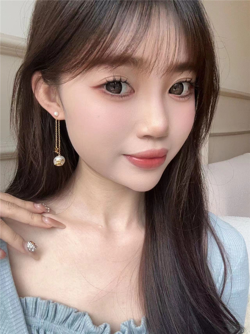 Ce1i*e double chain arc de triomphe hanging bead earrings