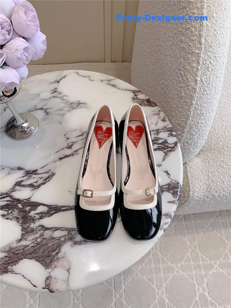 Roger Vivier Viv’ Podium Ballerinas in Patent Black and White
