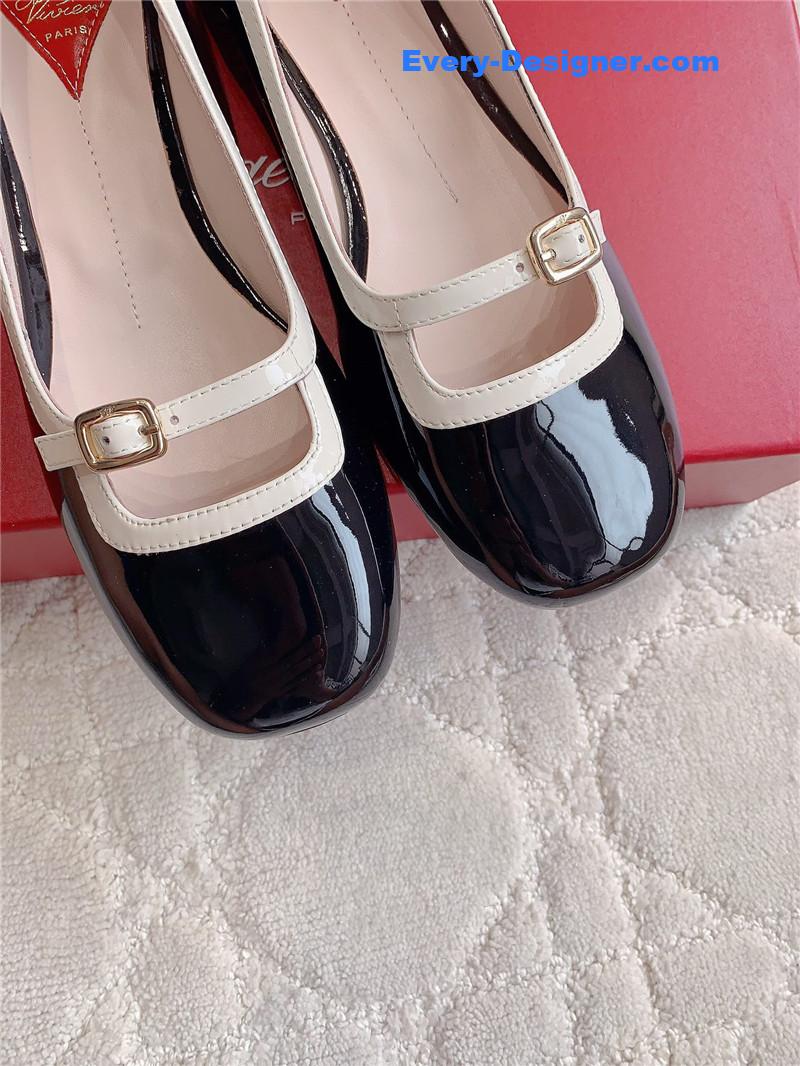 Roger Vivier Viv’ Podium Ballerinas in Patent Black and White