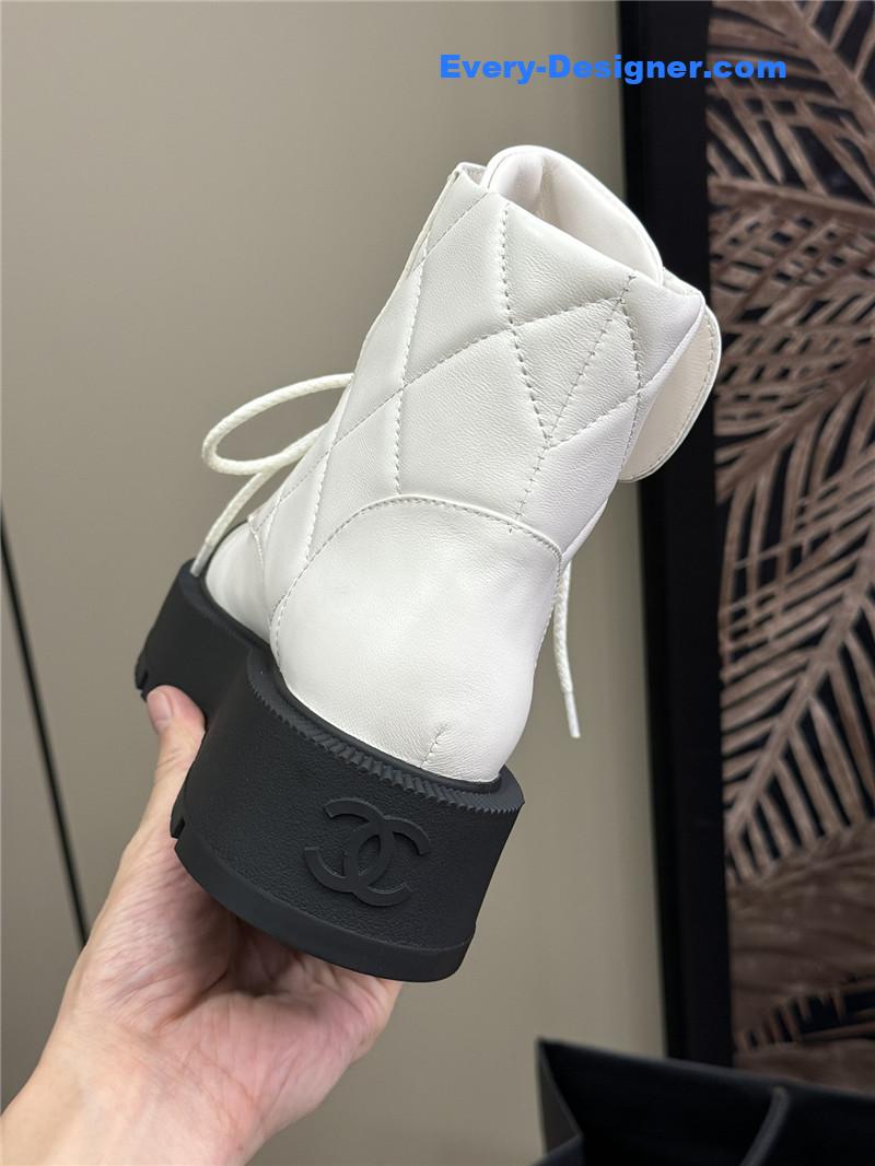 Ch**el combat ankle boots in white