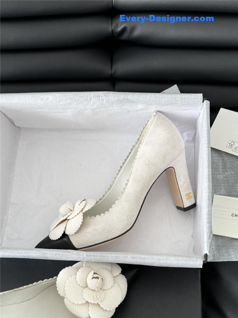 Ch**el camellia heel pumps in white suede leather