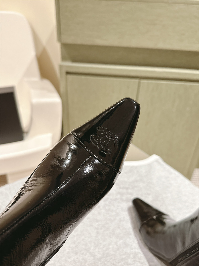 Ch**el pointed oil-wax leather knee-high boots