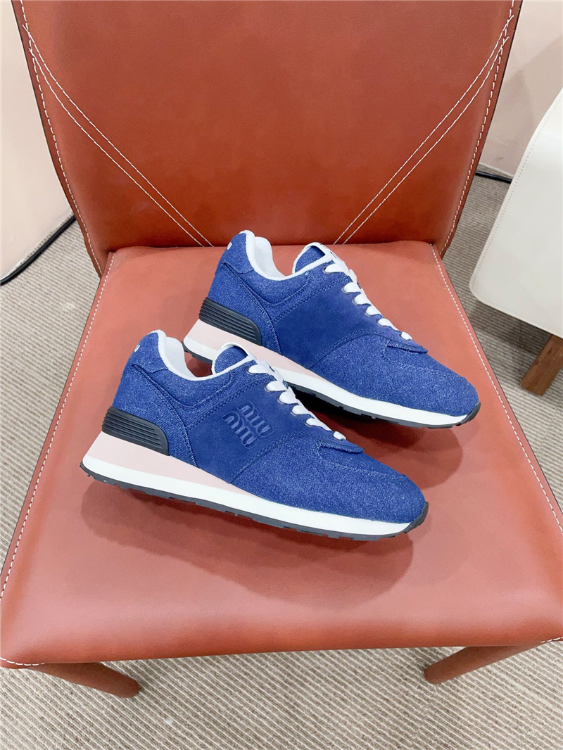 Miu Miu x New Balance 574 Leather Sneakers in Blue