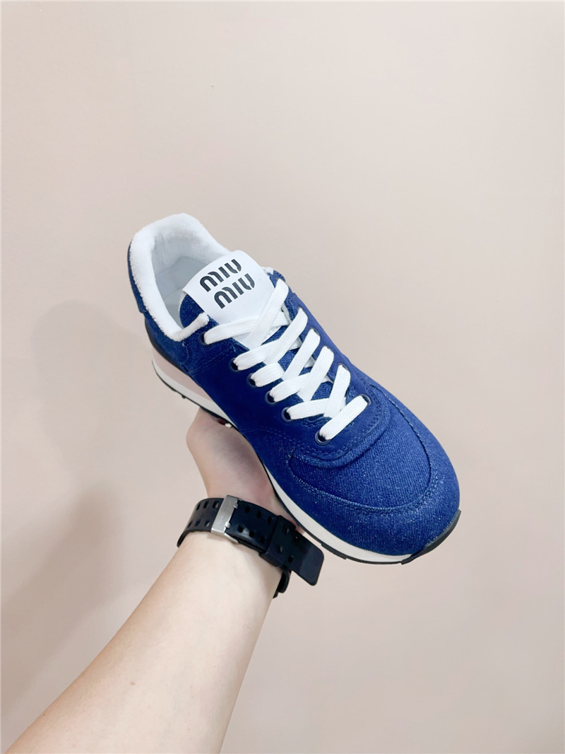 Miu Miu x New Balance 574 Leather Sneakers in Blue