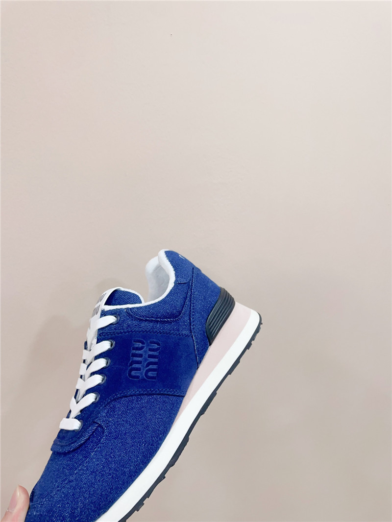 Miu Miu x New Balance 574 Leather Sneakers in Blue
