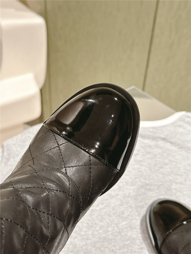 Ch**el black quilted leather cap toe ankle boots