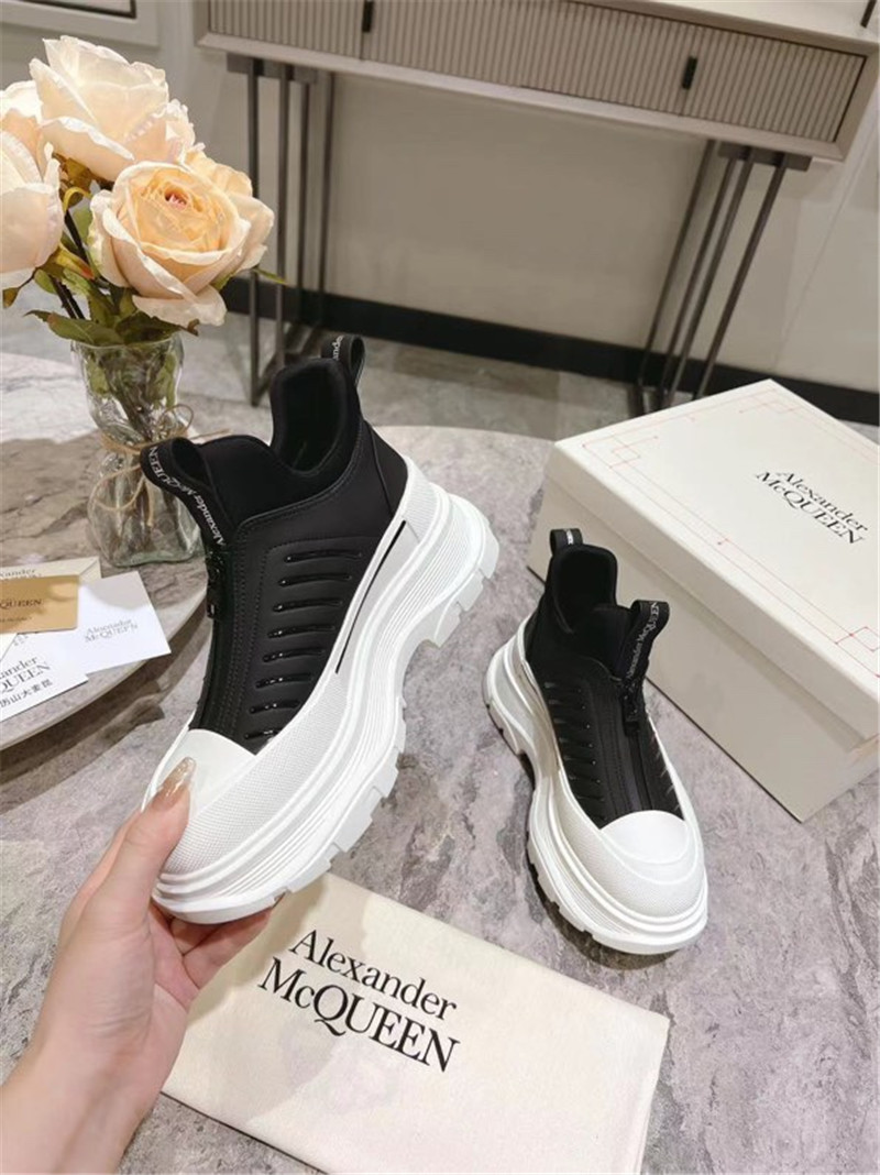 a1exa*der Mcqv*en zip-up low top sneakers