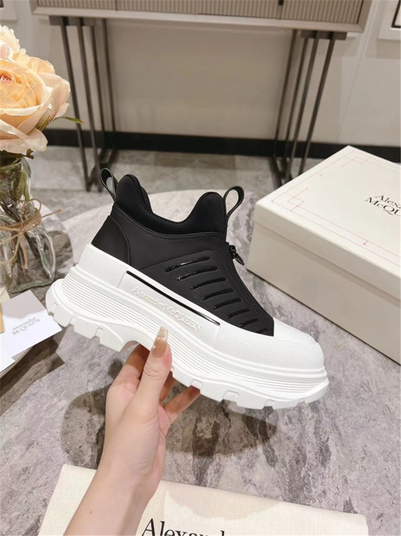 a1exa*der Mcqv*en zip-up low top sneakers