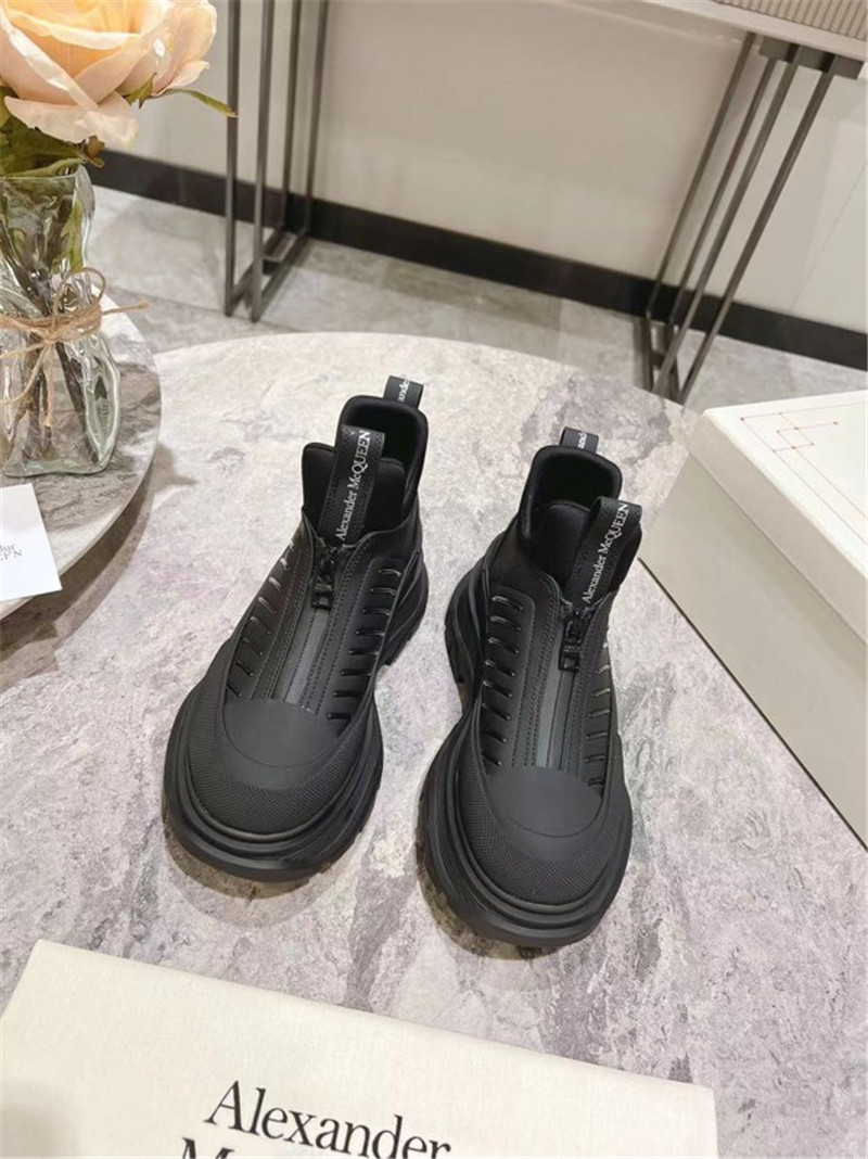 a1exa*der Mcqv*en black zip-up low top sneakers