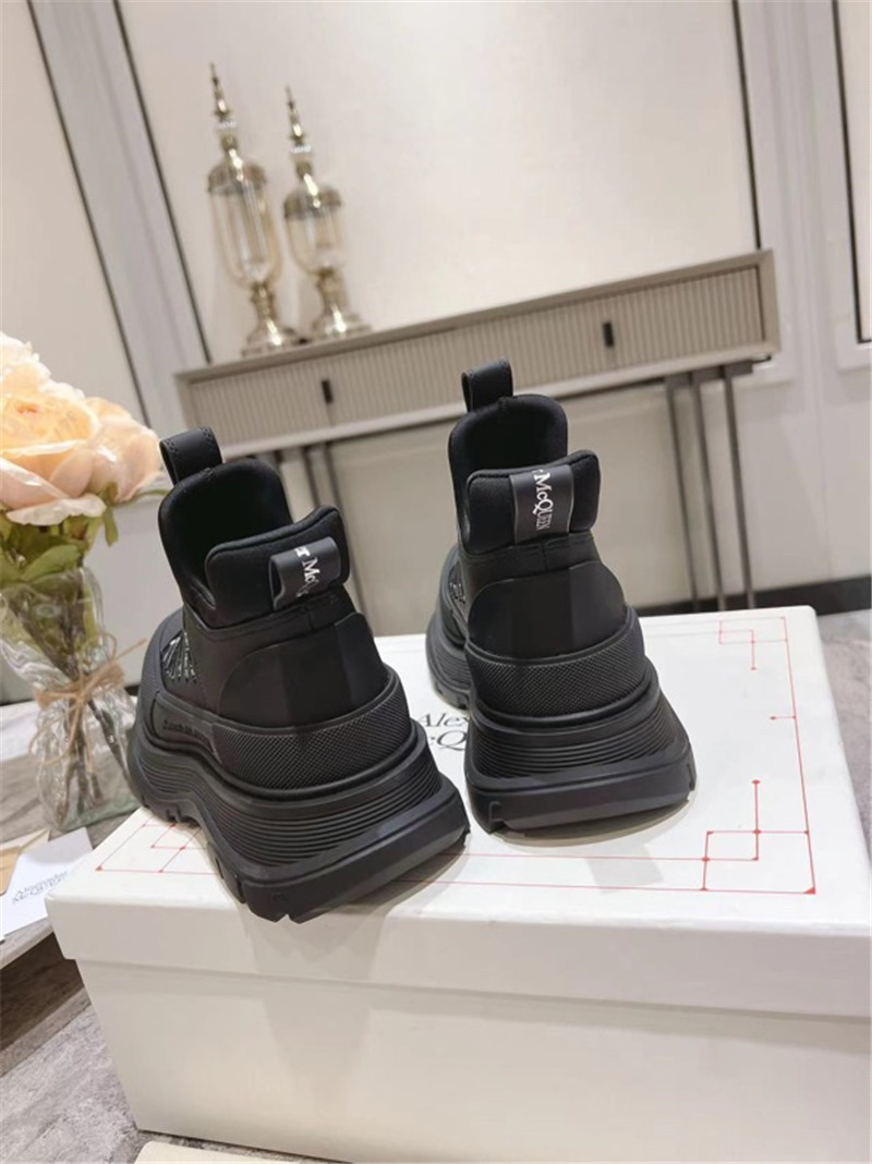 a1exa*der Mcqv*en black zip-up low top sneakers