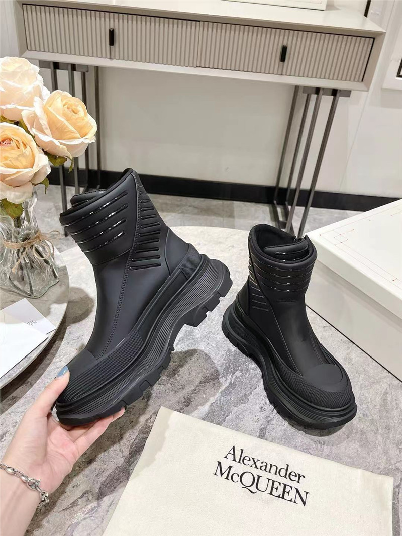 a1exa*der Mcqv*en black tread slick high top sneakers