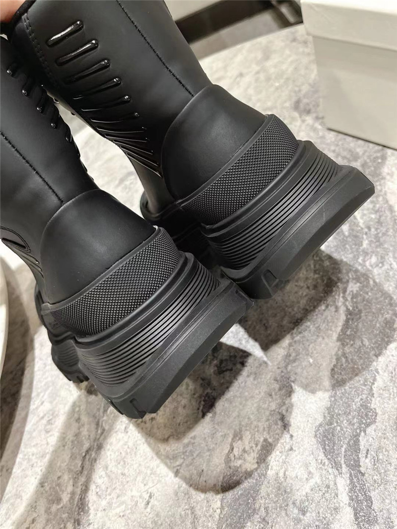 a1exa*der Mcqv*en black tread slick high top sneakers