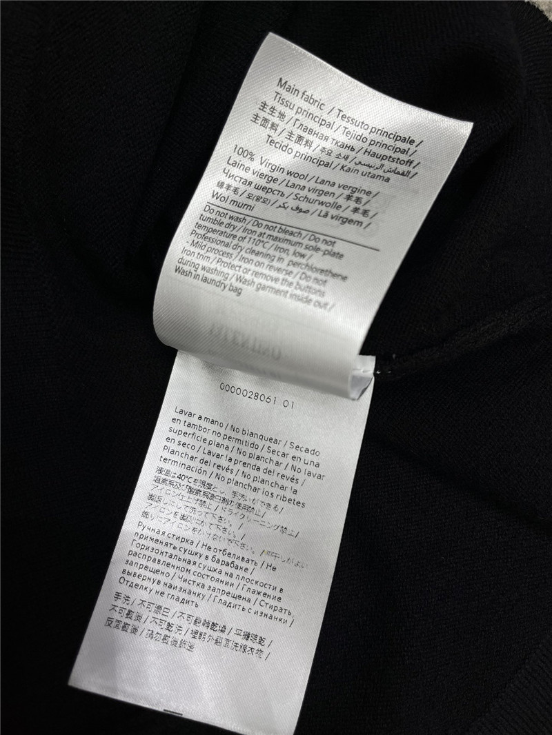 Va1e*ntin0 ruffled viscose and wool sweater black