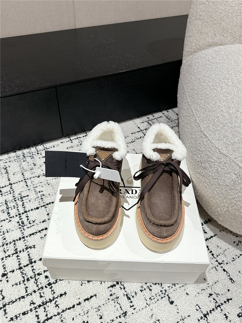 Pra*a brown suede shearling platform ankle boots