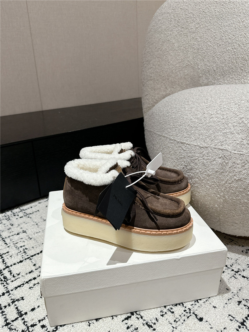 Pra*a brown suede shearling platform ankle boots